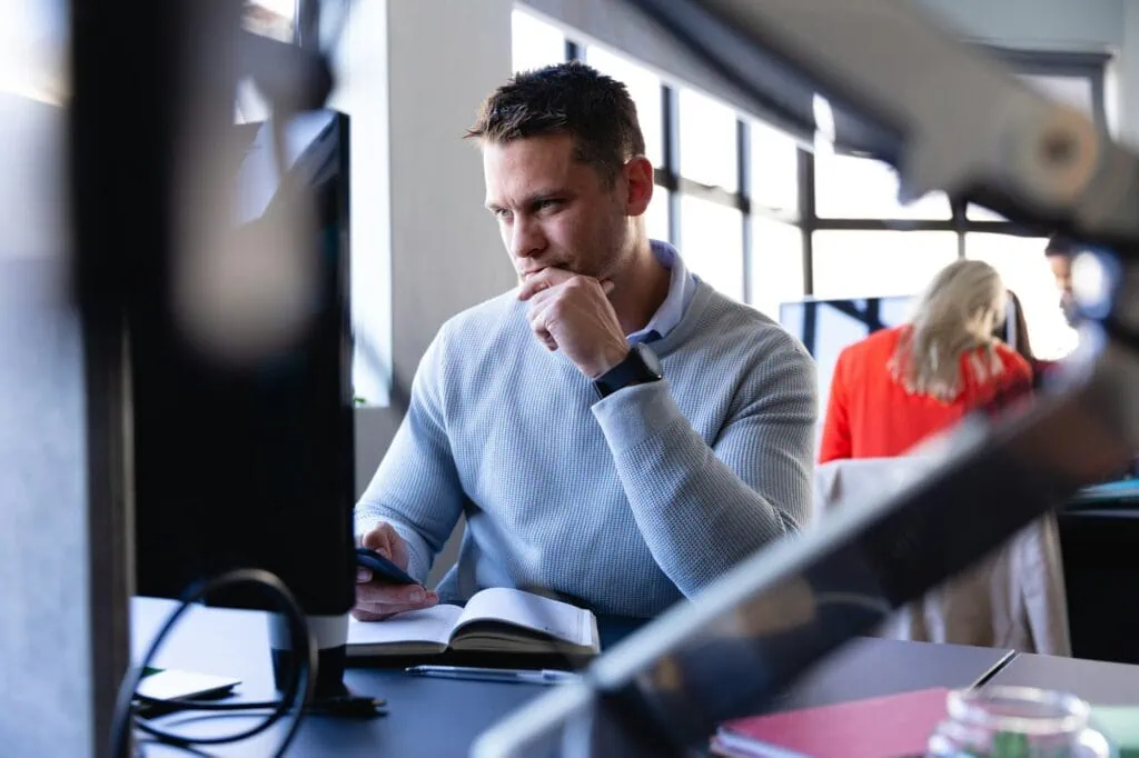 Caucasian man working in office